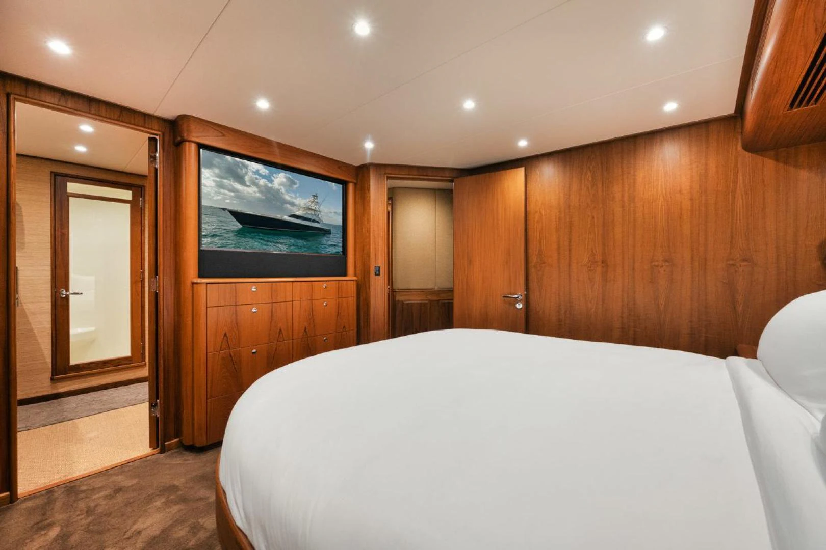 a bed in a room aboard OWL'S NEST Yacht for Sale