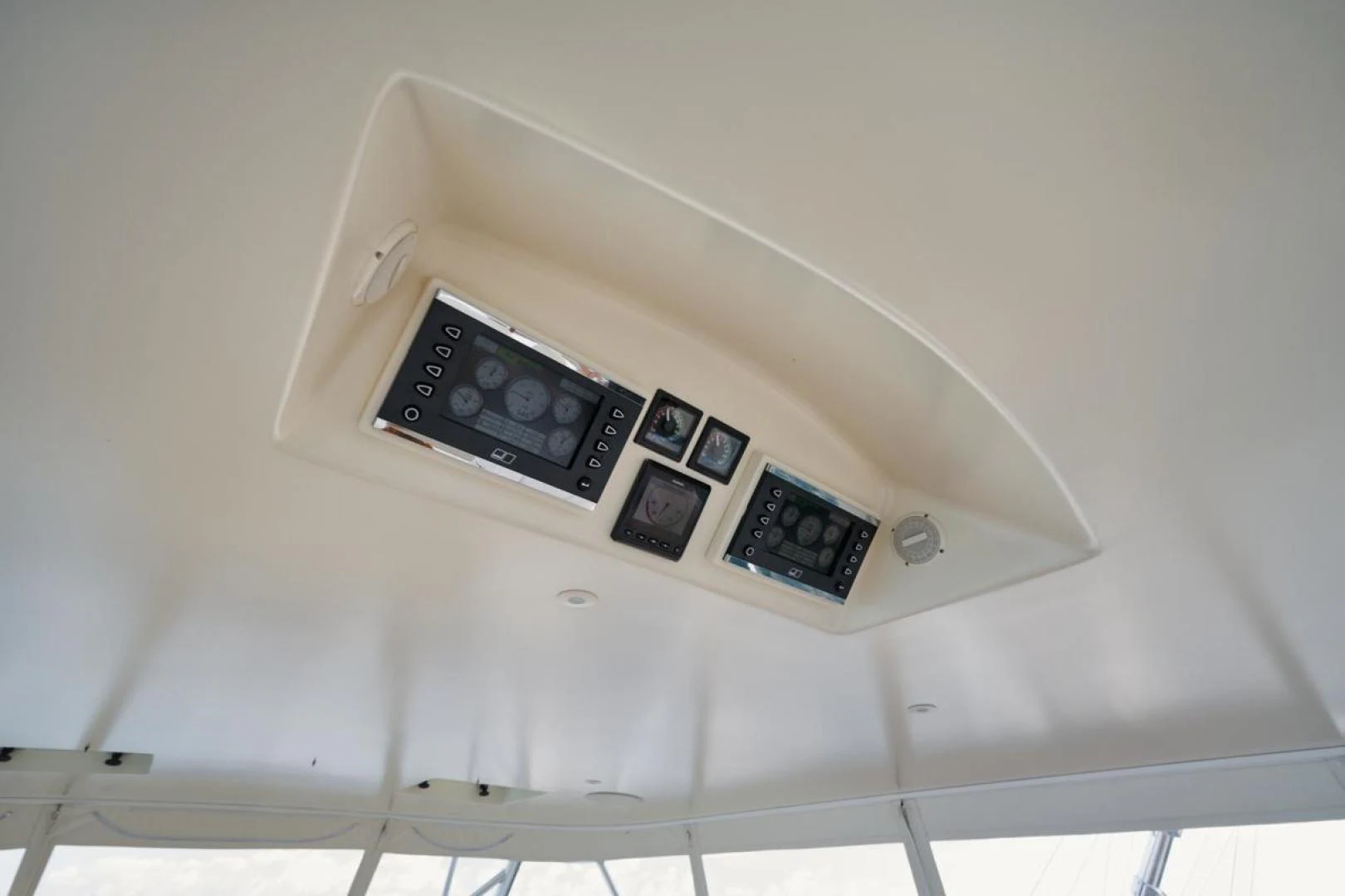 a white box with a black dial and a silver box with buttons aboard OWL'S NEST Yacht for Sale