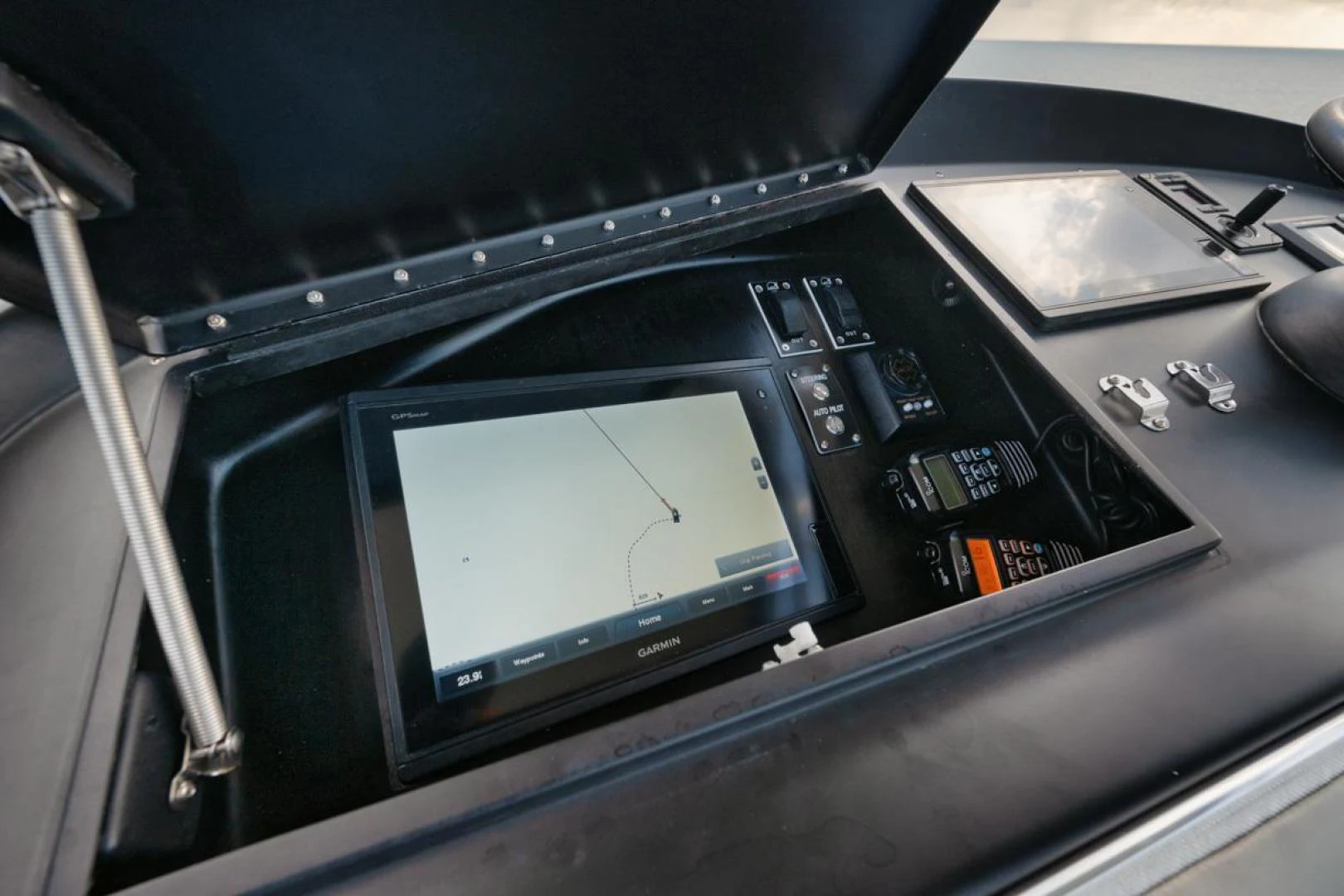 a black electronic device aboard OWL'S NEST Yacht for Sale
