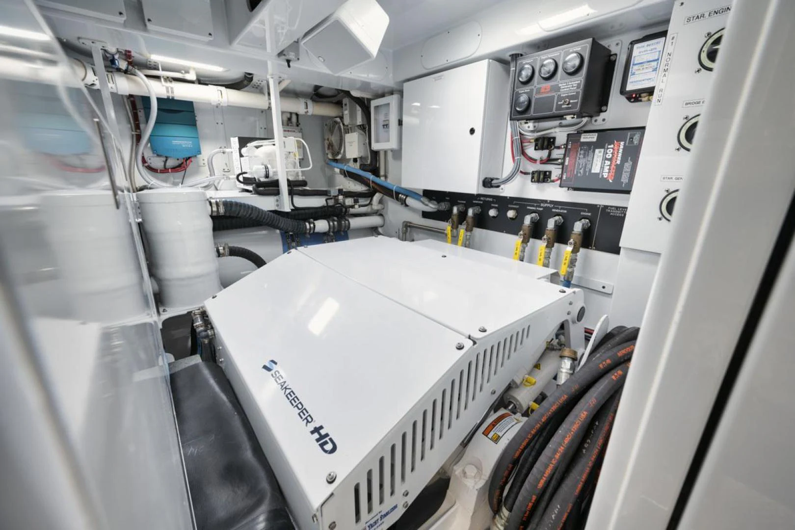 a machine with a large white object on the side aboard OWL'S NEST Yacht for Sale