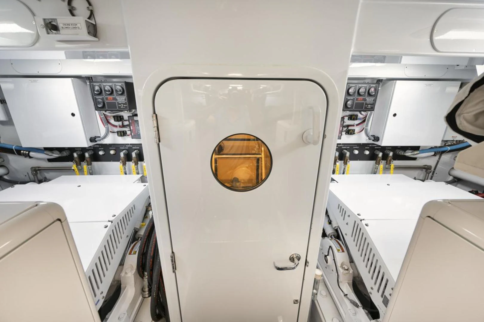 a white machine with a brown circle in the center aboard OWL'S NEST Yacht for Sale
