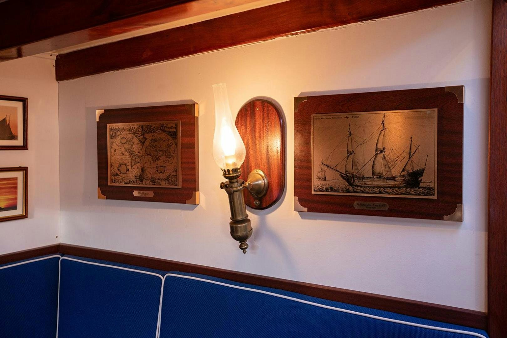a wall with art on it aboard SKYTHIA Yacht for Sale
