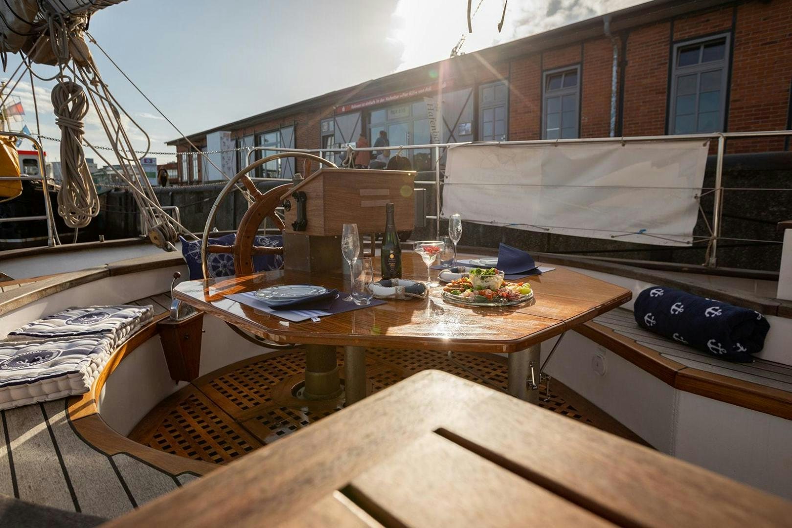 a table with food on it aboard SKYTHIA Yacht for Sale