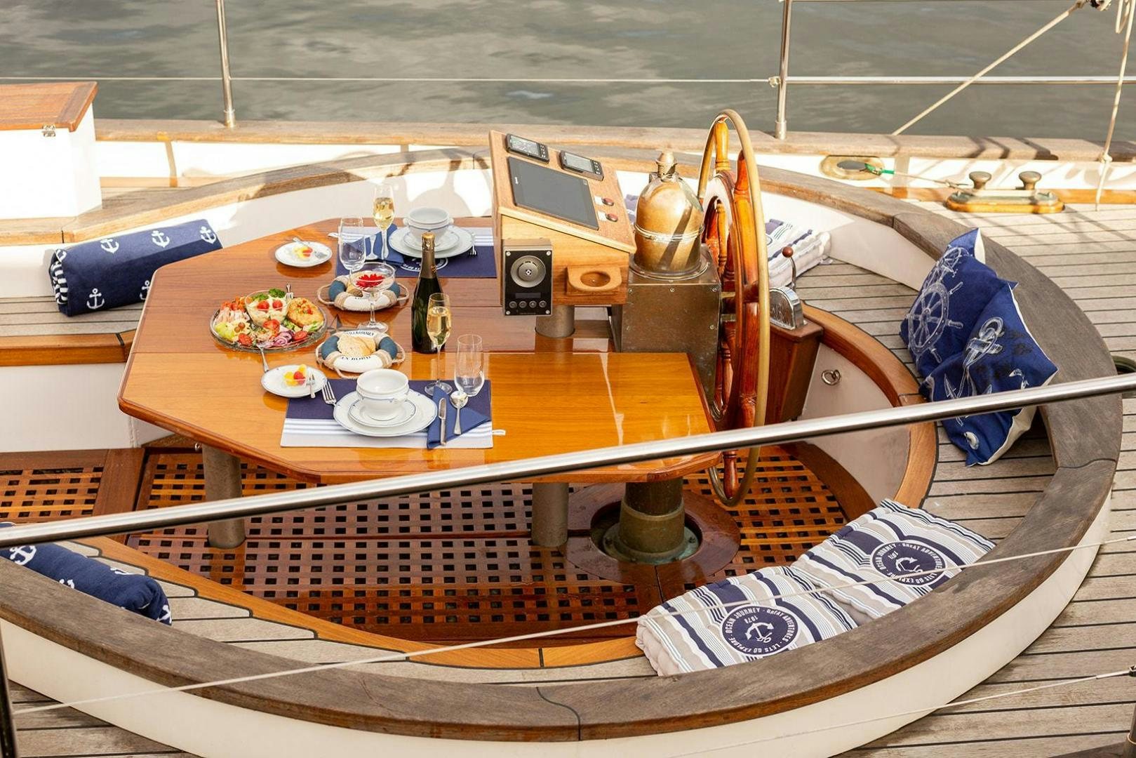 a wooden model of a ship aboard SKYTHIA Yacht for Sale