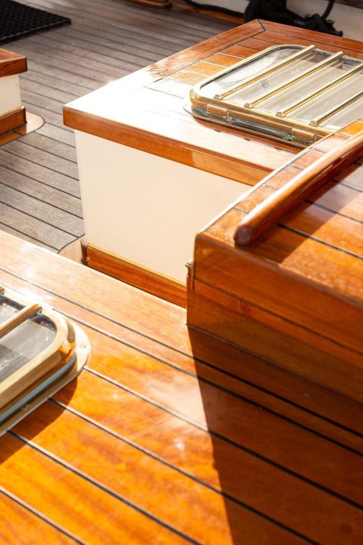 a wooden box with a wooden handle aboard SKYTHIA Yacht for Sale