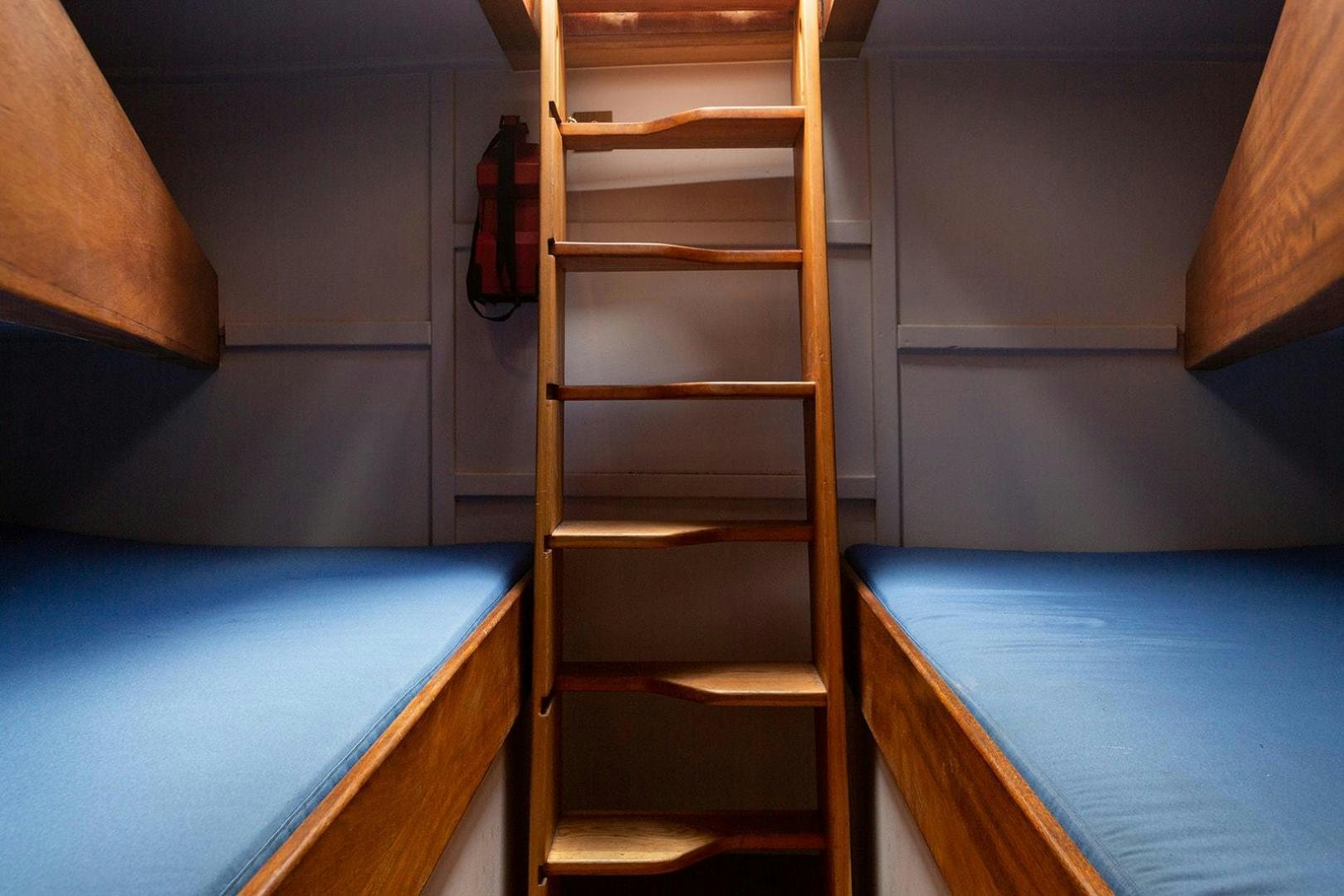 bunk beds in a room aboard SKYTHIA Yacht for Sale