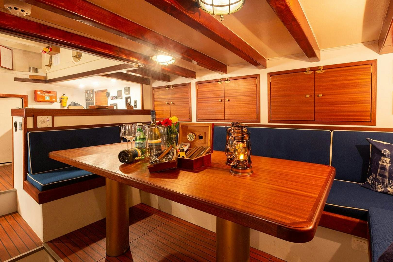a table with glasses on it aboard SKYTHIA Yacht for Sale