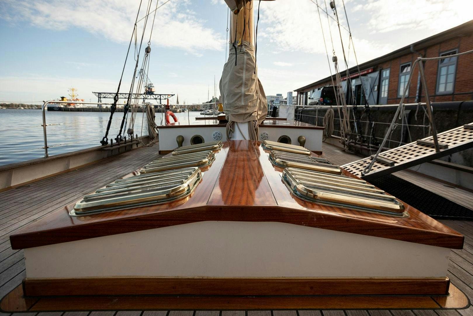 a boat docked at a pier aboard SKYTHIA Yacht for Sale