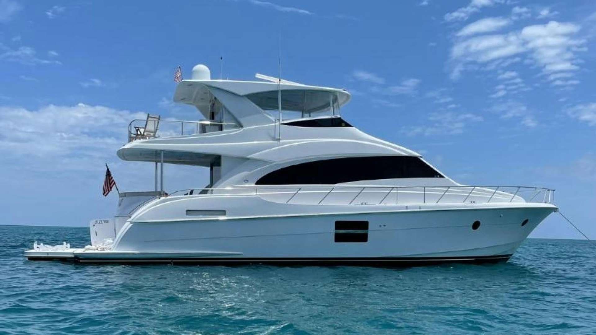 a white yacht in the water aboard WEST Yacht for Sale