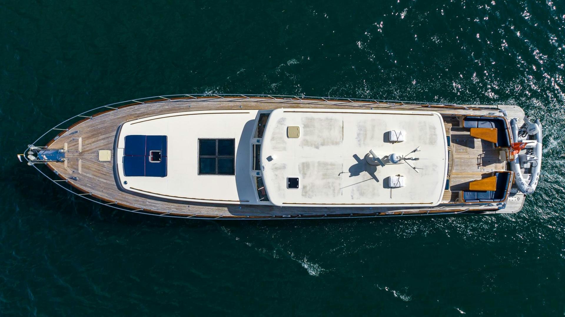 a boat on the water aboard ESSENCE OF CAYMAN Yacht for Sale