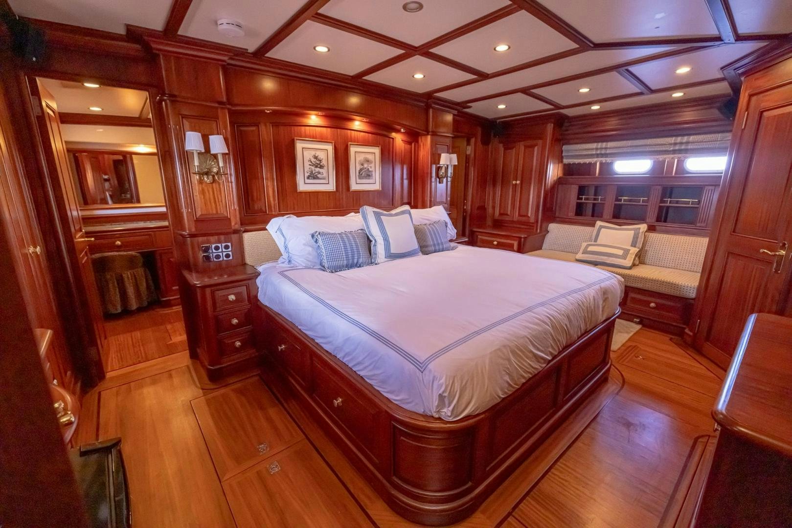 a bed in a room aboard ESSENCE OF CAYMAN Yacht for Sale