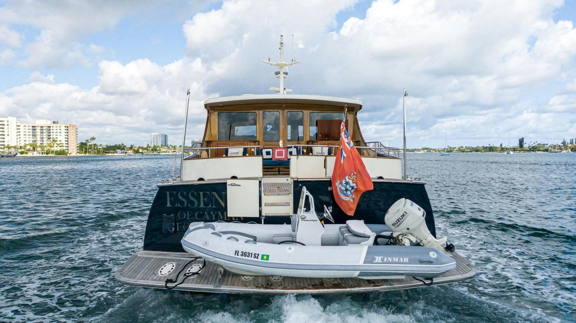 a boat on the water aboard ESSENCE OF CAYMAN Yacht for Sale