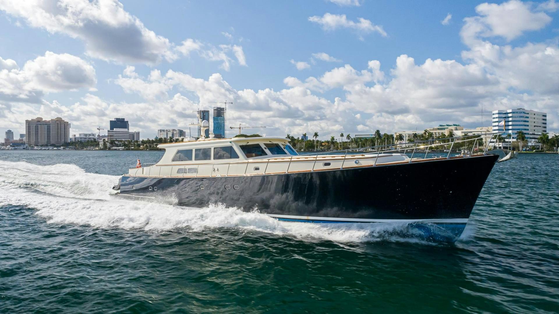 a boat on the water aboard ESSENCE OF CAYMAN Yacht for Sale