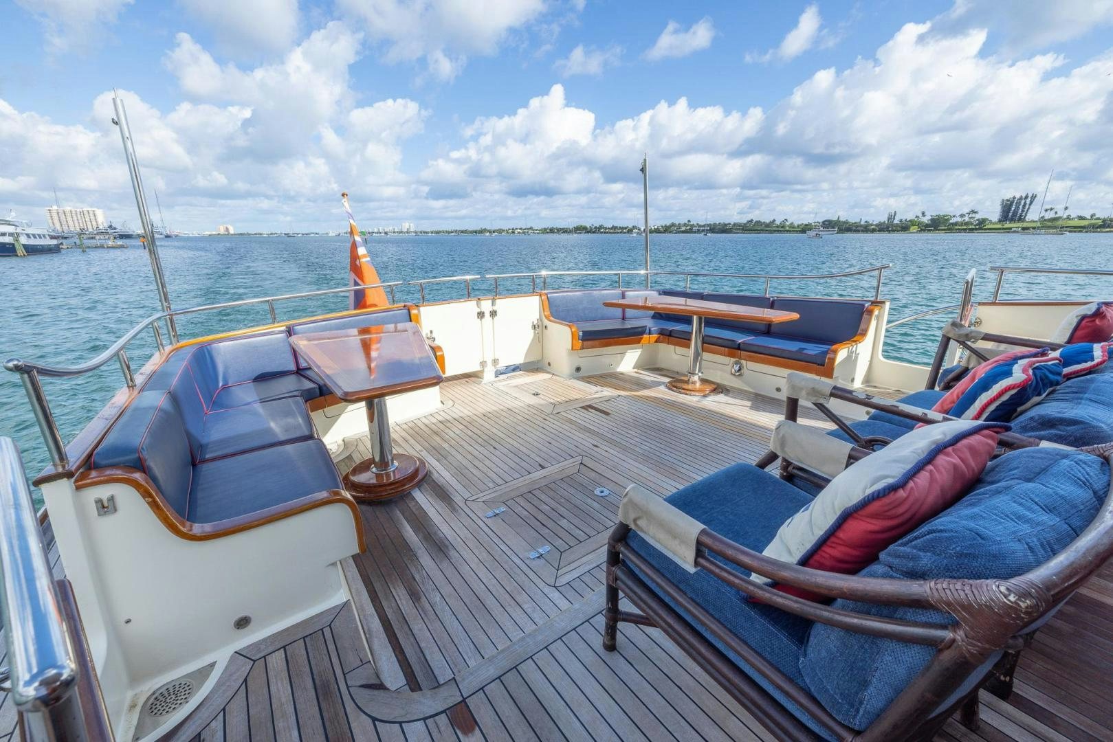 a boat is parked on the dock aboard ESSENCE OF CAYMAN Yacht for Sale