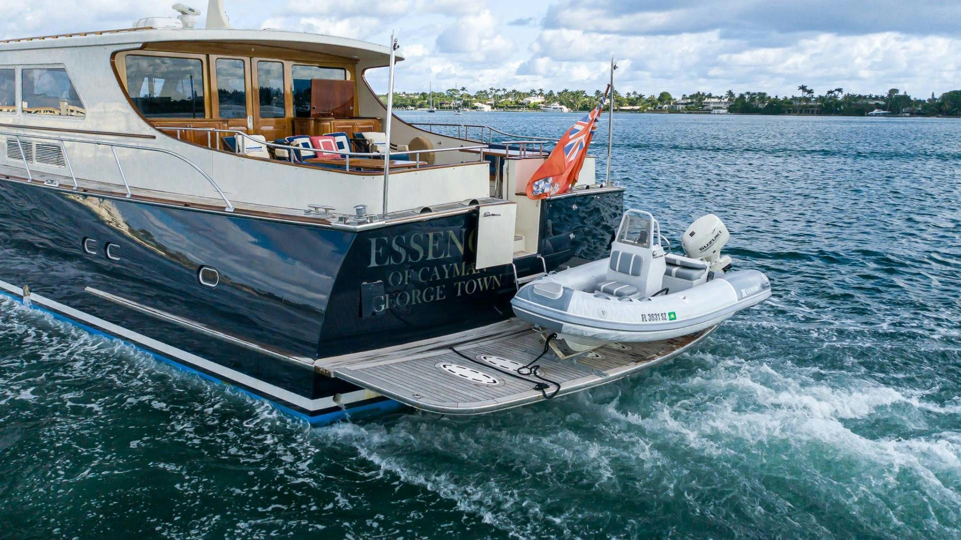 a boat on the water aboard ESSENCE OF CAYMAN Yacht for Sale