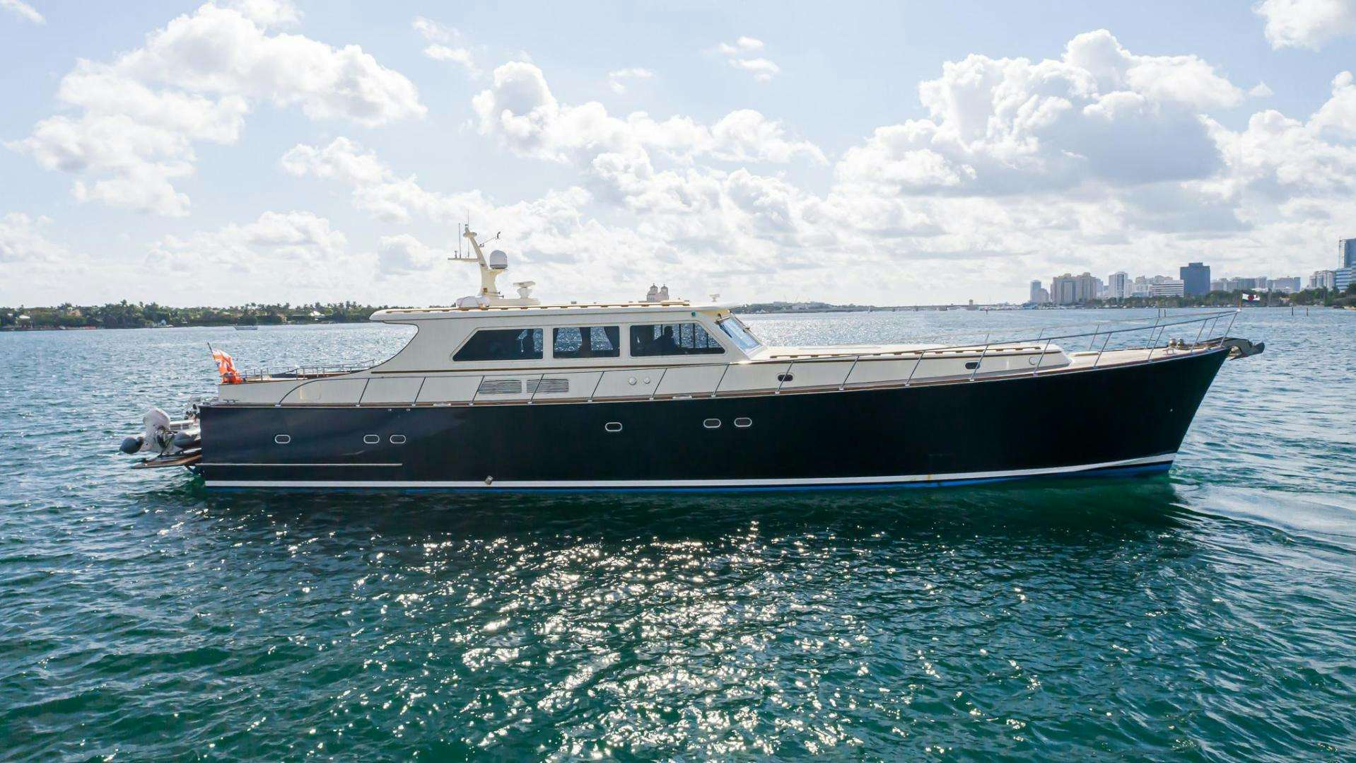 a boat in the water aboard ESSENCE OF CAYMAN Yacht for Sale