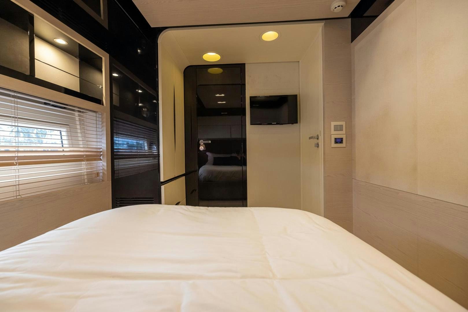 a bed in a room aboard HAPPY HOURS Yacht for Sale