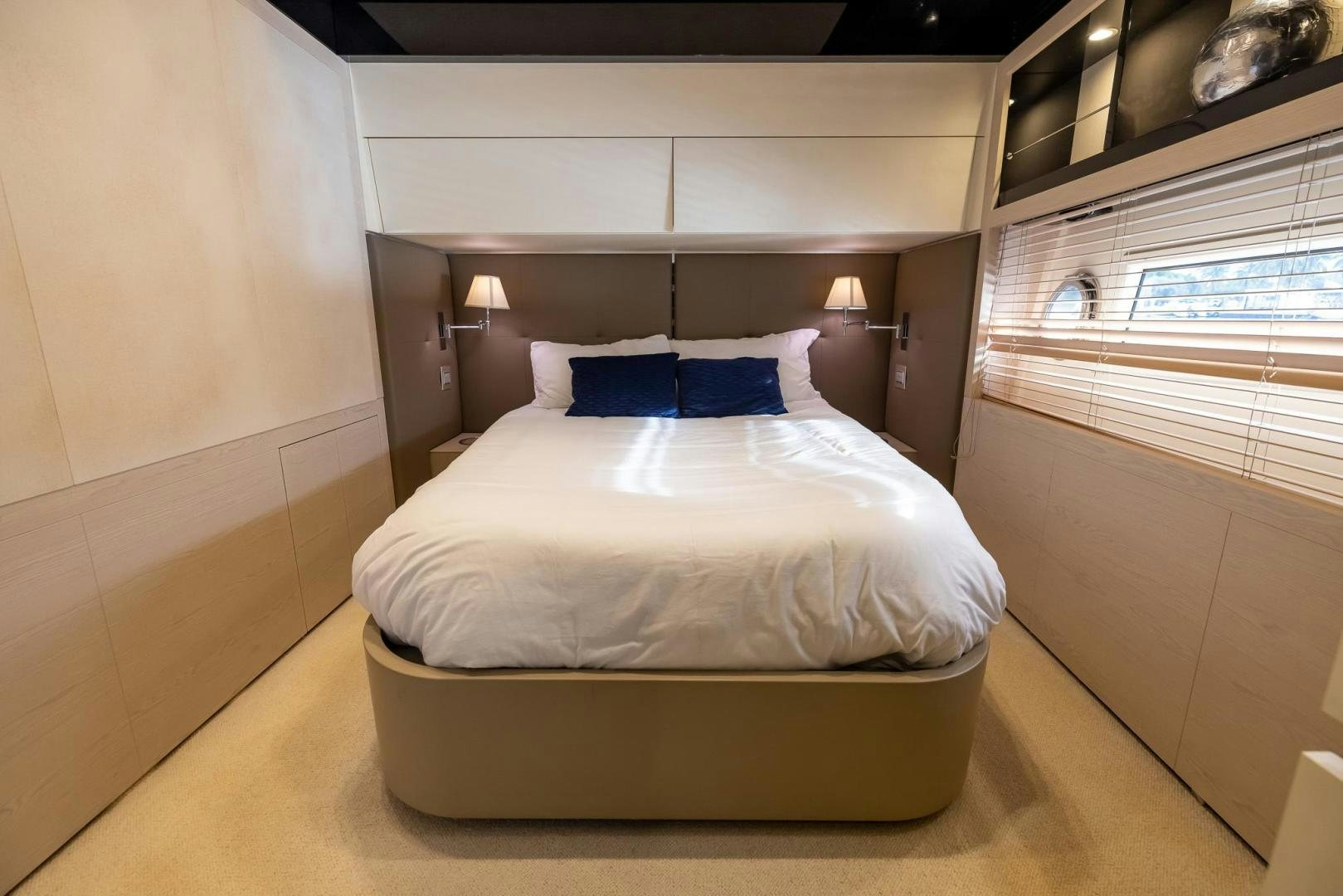 a bed in a room aboard HAPPY HOURS Yacht for Sale