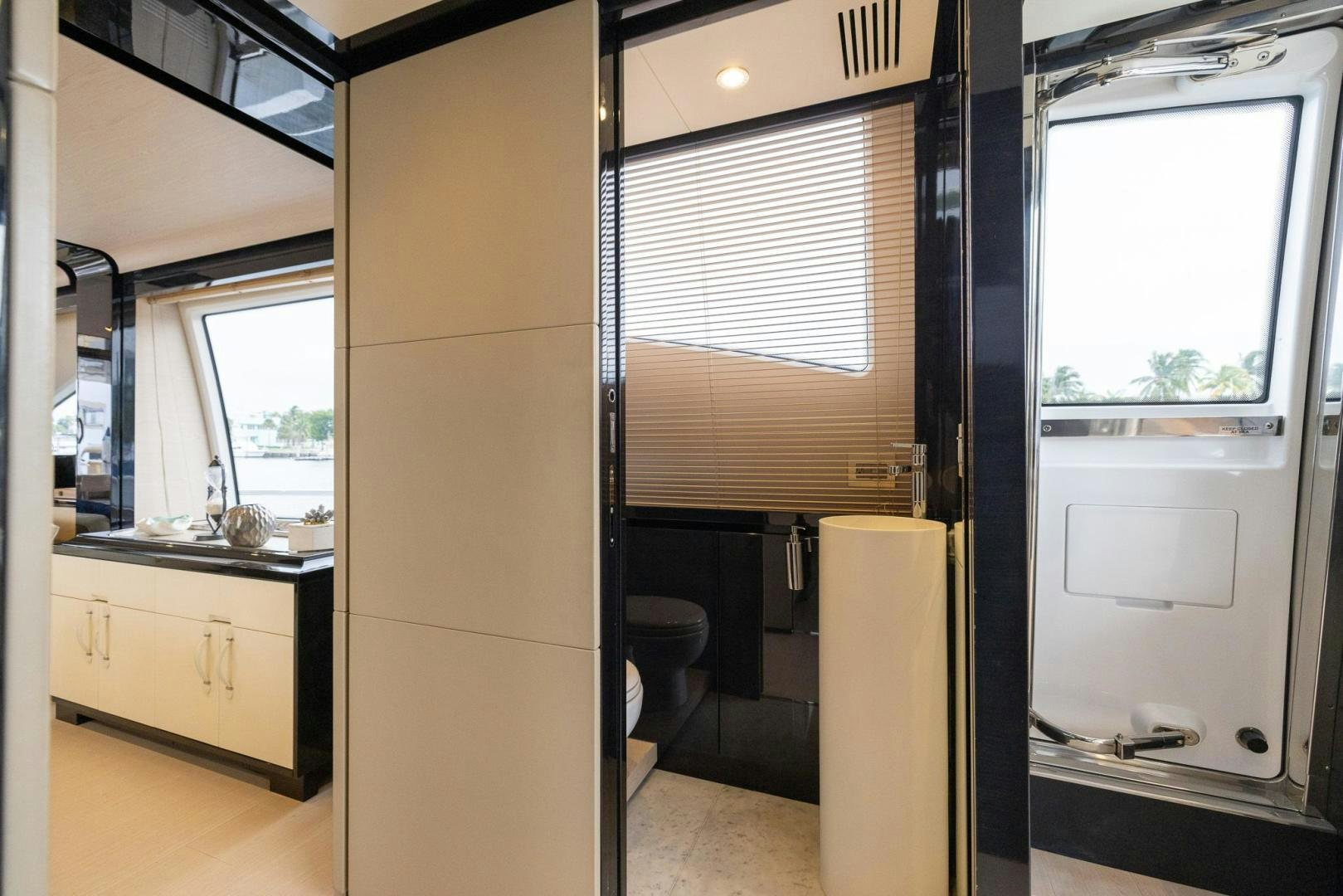 a room with a sink and a toilet aboard HAPPY HOURS Yacht for Sale