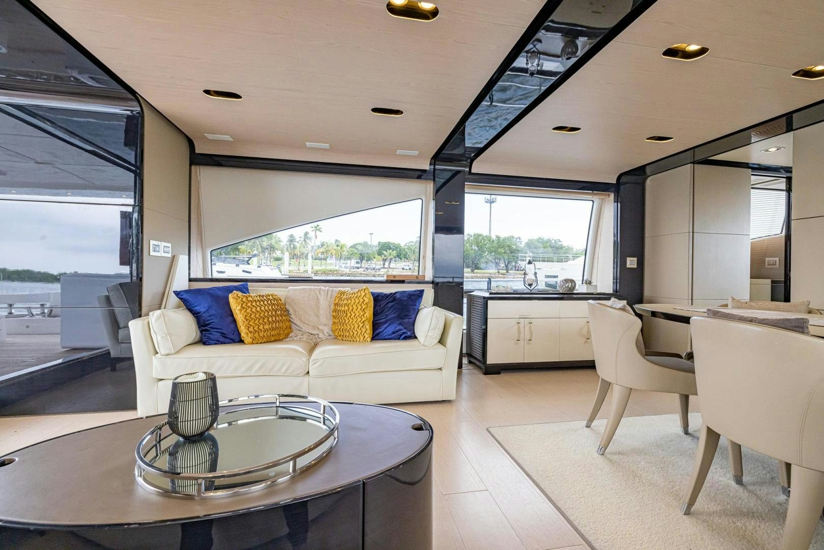 a living room with a large window aboard HAPPY HOURS Yacht for Sale