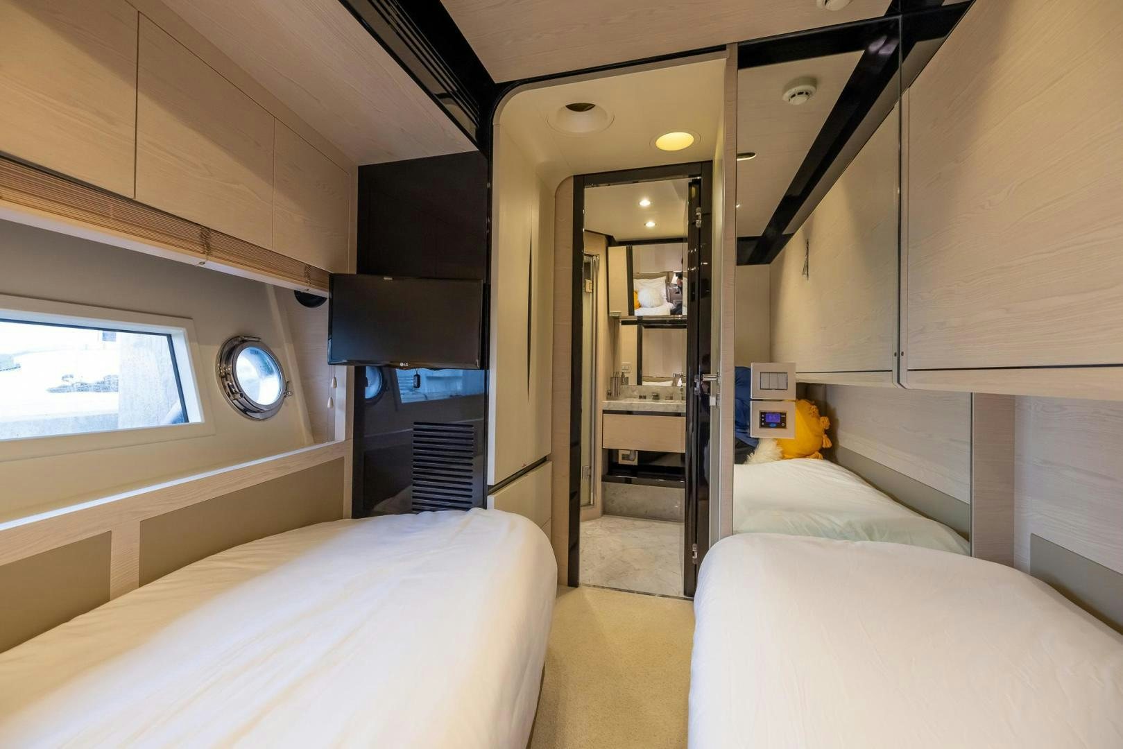 a room with a bed and a desk aboard HAPPY HOURS Yacht for Sale
