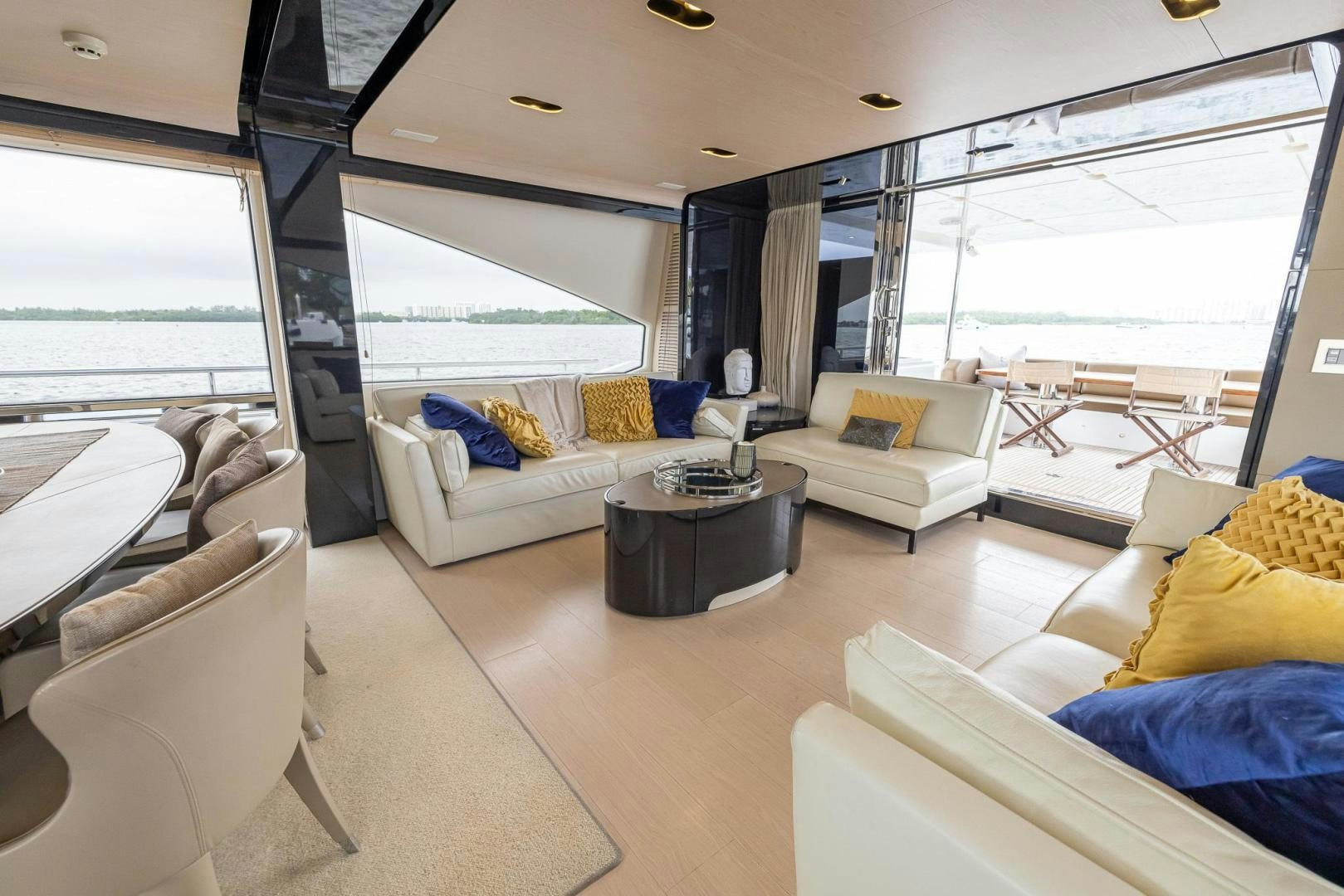 a living room with a large window aboard HAPPY HOURS Yacht for Sale