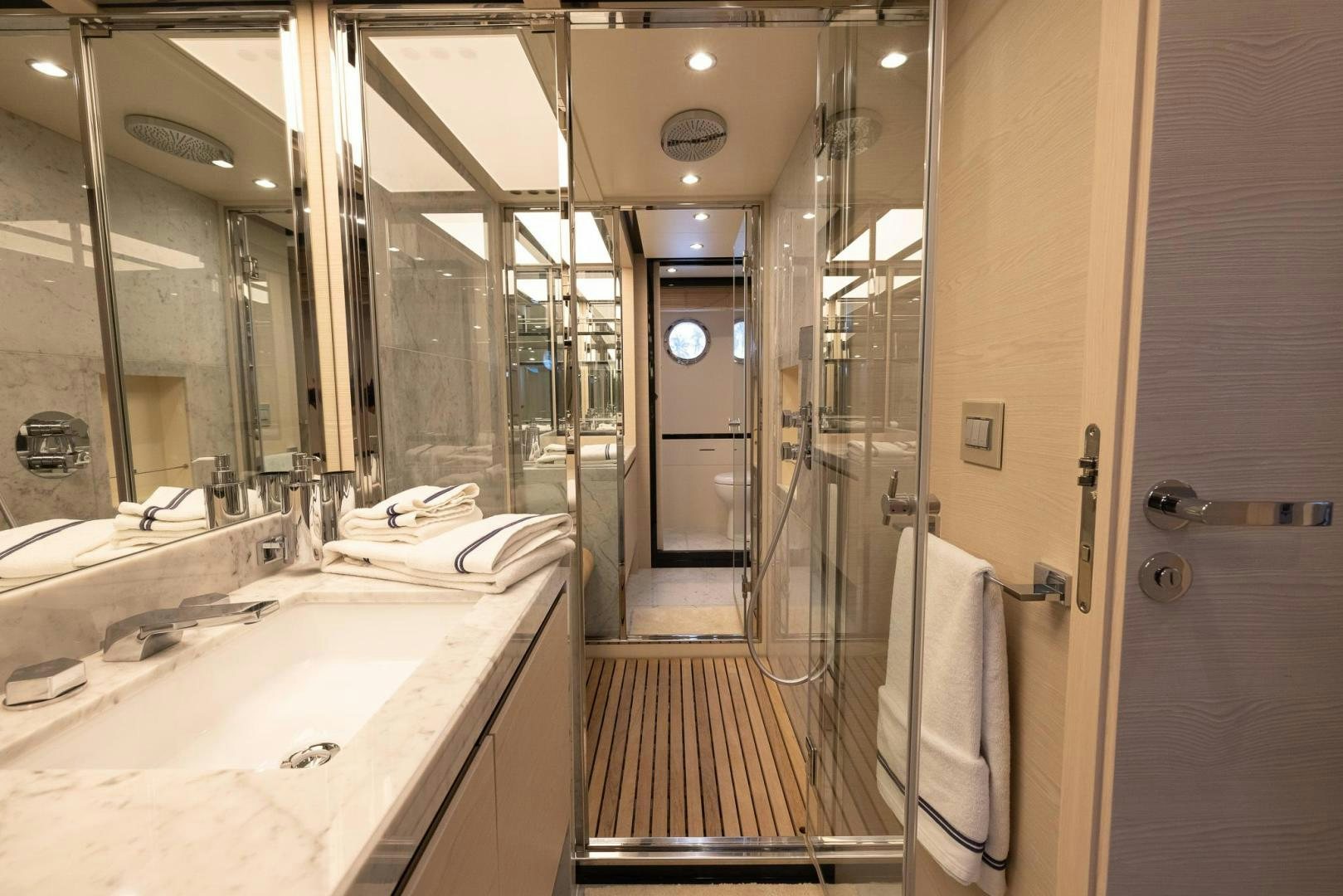 a bathroom with a sink and a shower aboard HAPPY HOURS Yacht for Sale