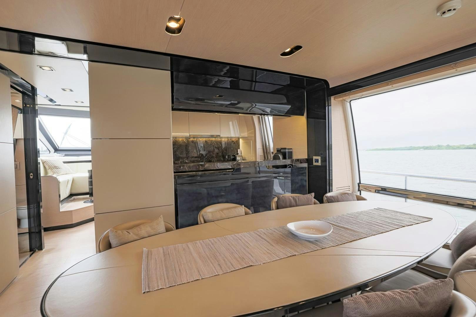 a room with a table and chairs aboard HAPPY HOURS Yacht for Sale