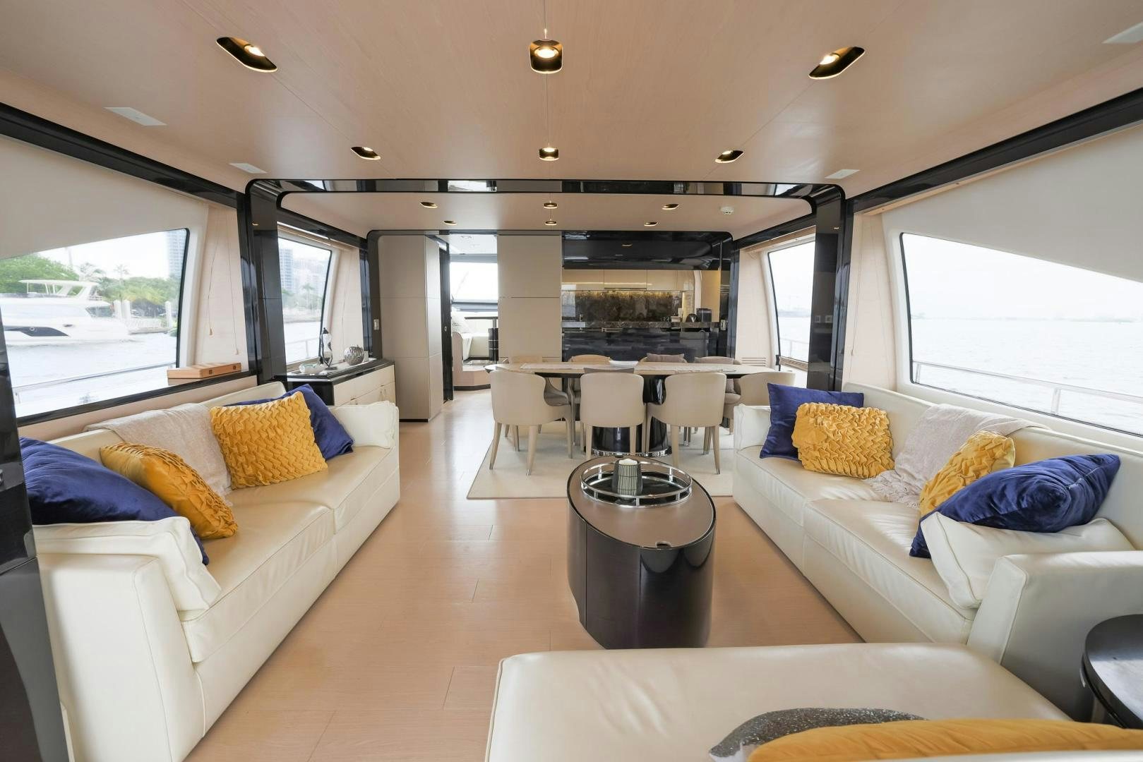 a living room with a large window aboard HAPPY HOURS Yacht for Sale