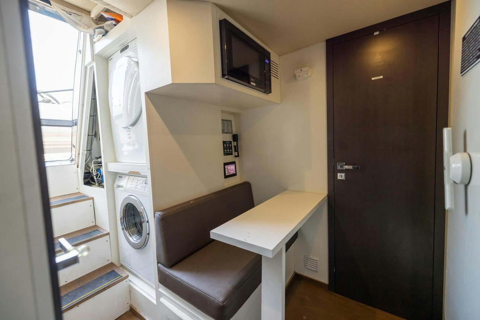 a room with a desk and a chair aboard HAPPY HOURS Yacht for Sale