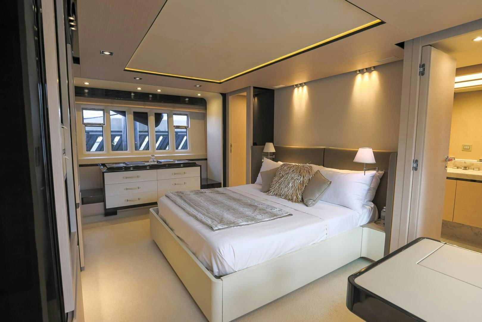 a bedroom with a bed aboard HAPPY HOURS Yacht for Sale
