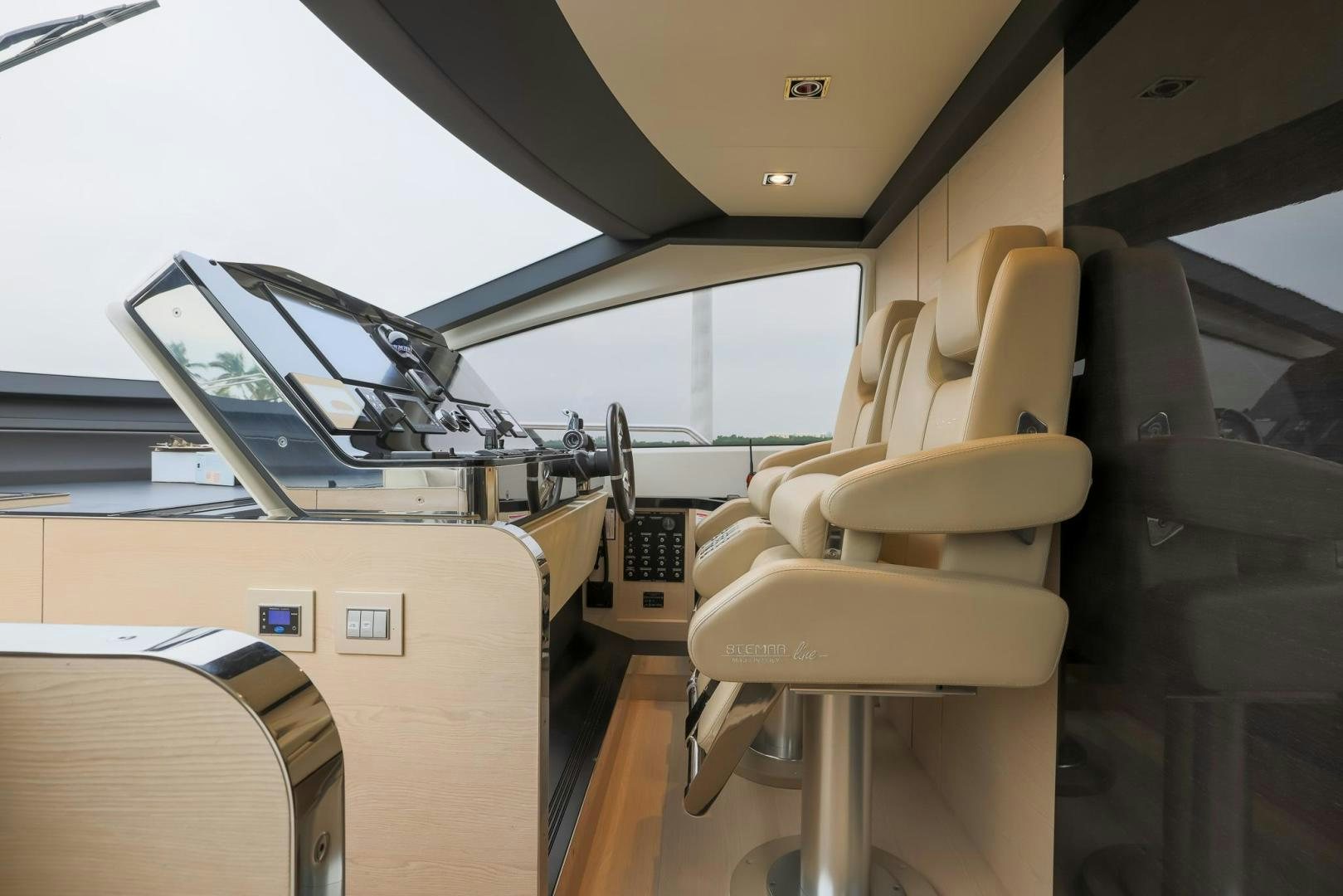 a room with a chair and desk aboard HAPPY HOURS Yacht for Sale