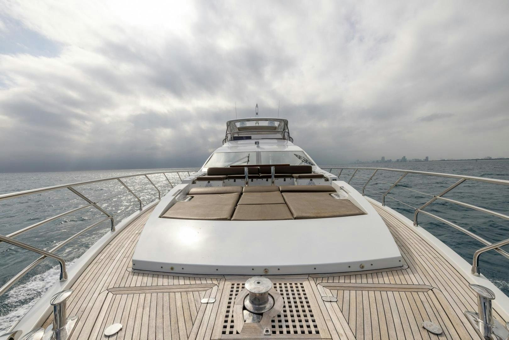 a boat on a deck aboard HAPPY HOURS Yacht for Sale