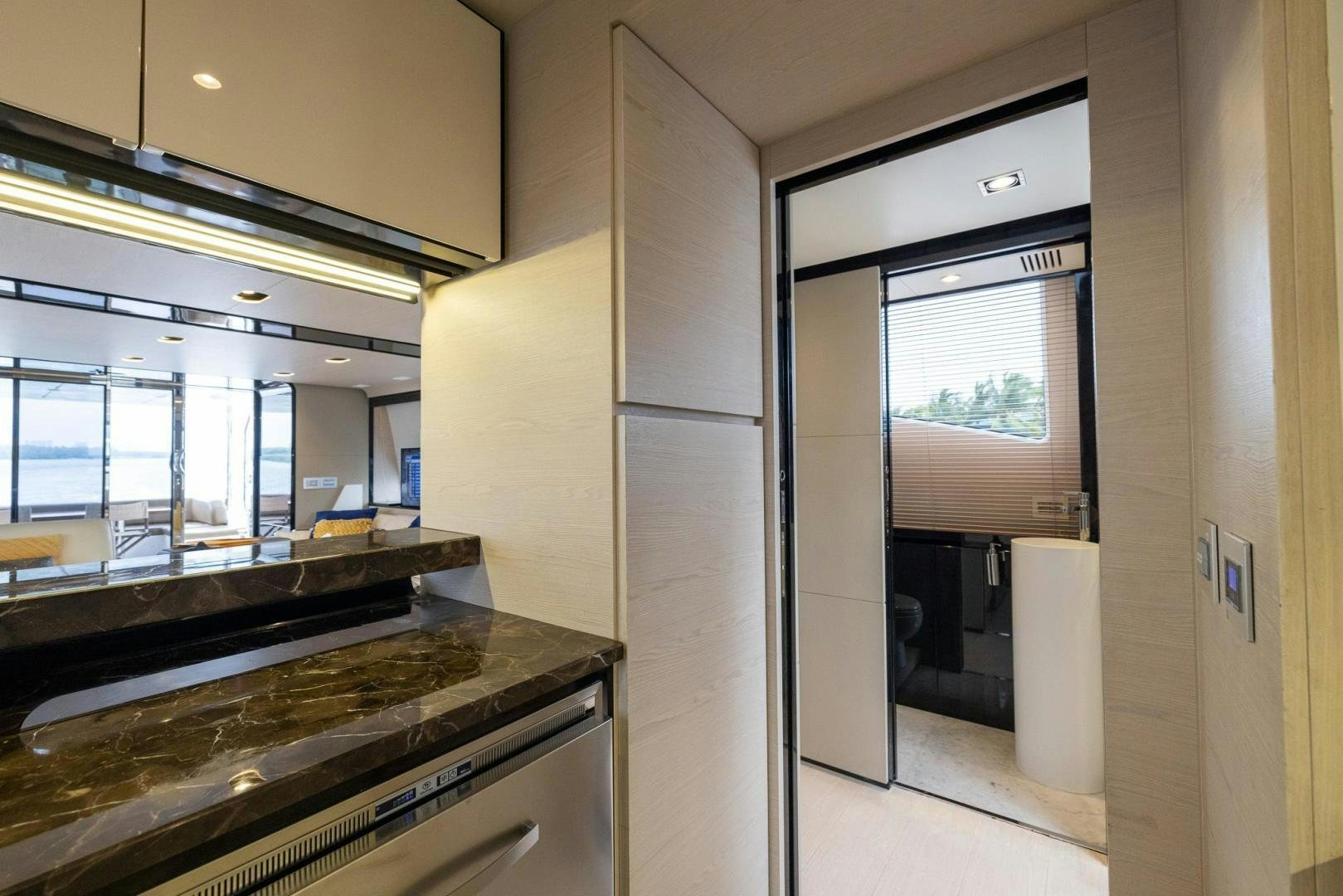 a kitchen with a stove and cabinets aboard HAPPY HOURS Yacht for Sale