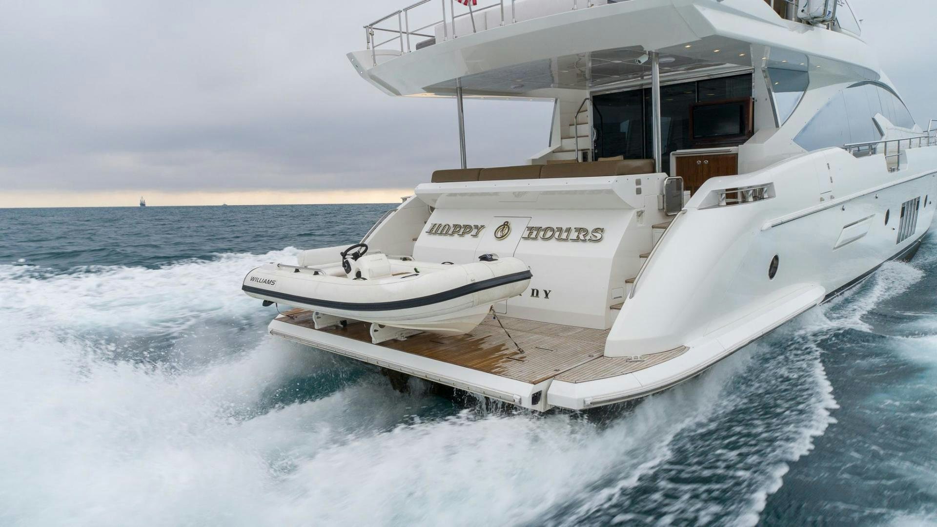 a boat on the water aboard HAPPY HOURS Yacht for Sale
