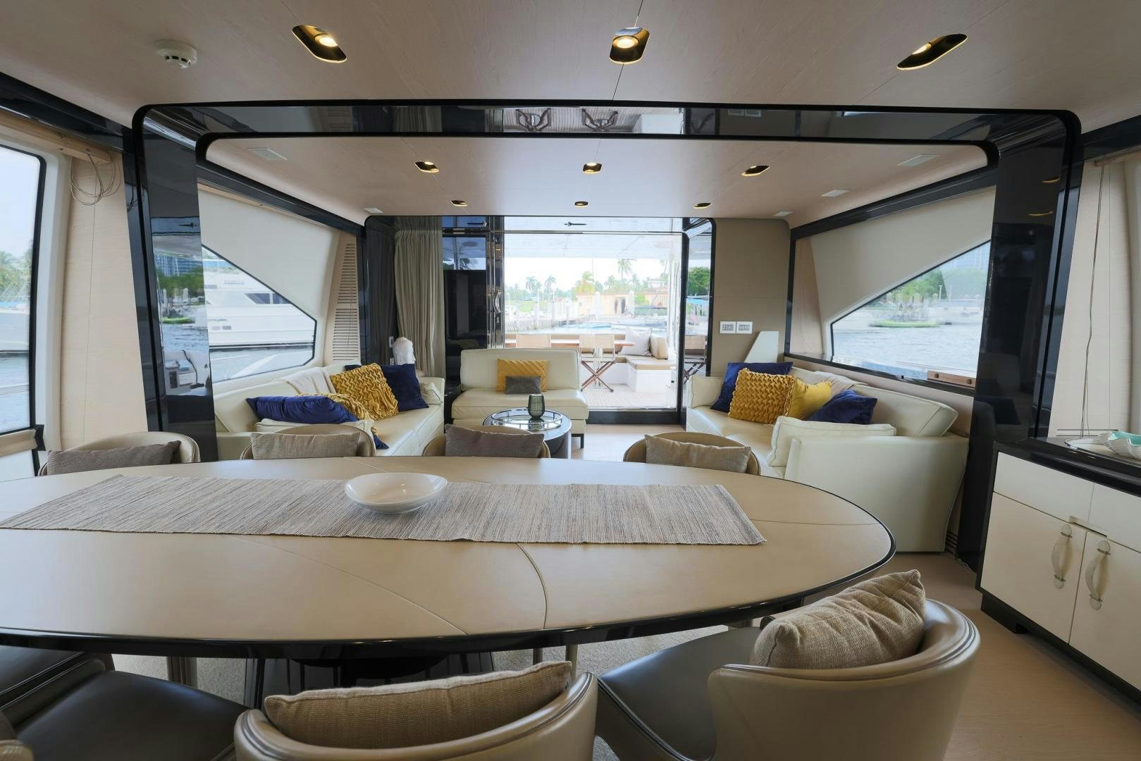 a large living room with a large window aboard HAPPY HOURS Yacht for Sale