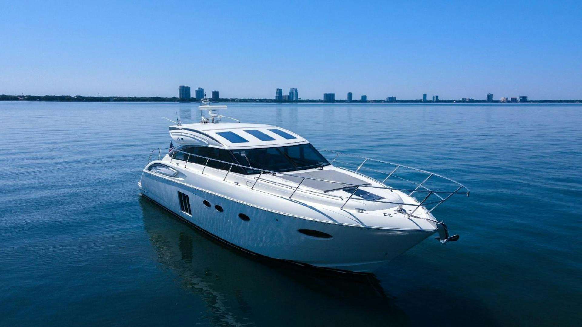 a white yacht on the water aboard POSEIDON Yacht for Sale