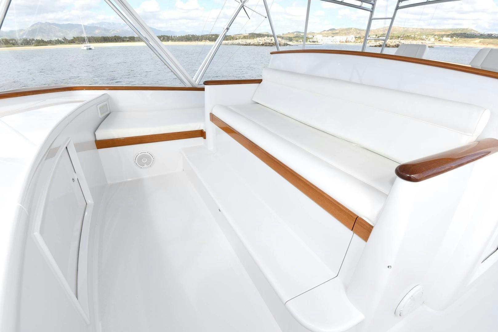 a white boat on a deck aboard MY LYNN Yacht for Sale