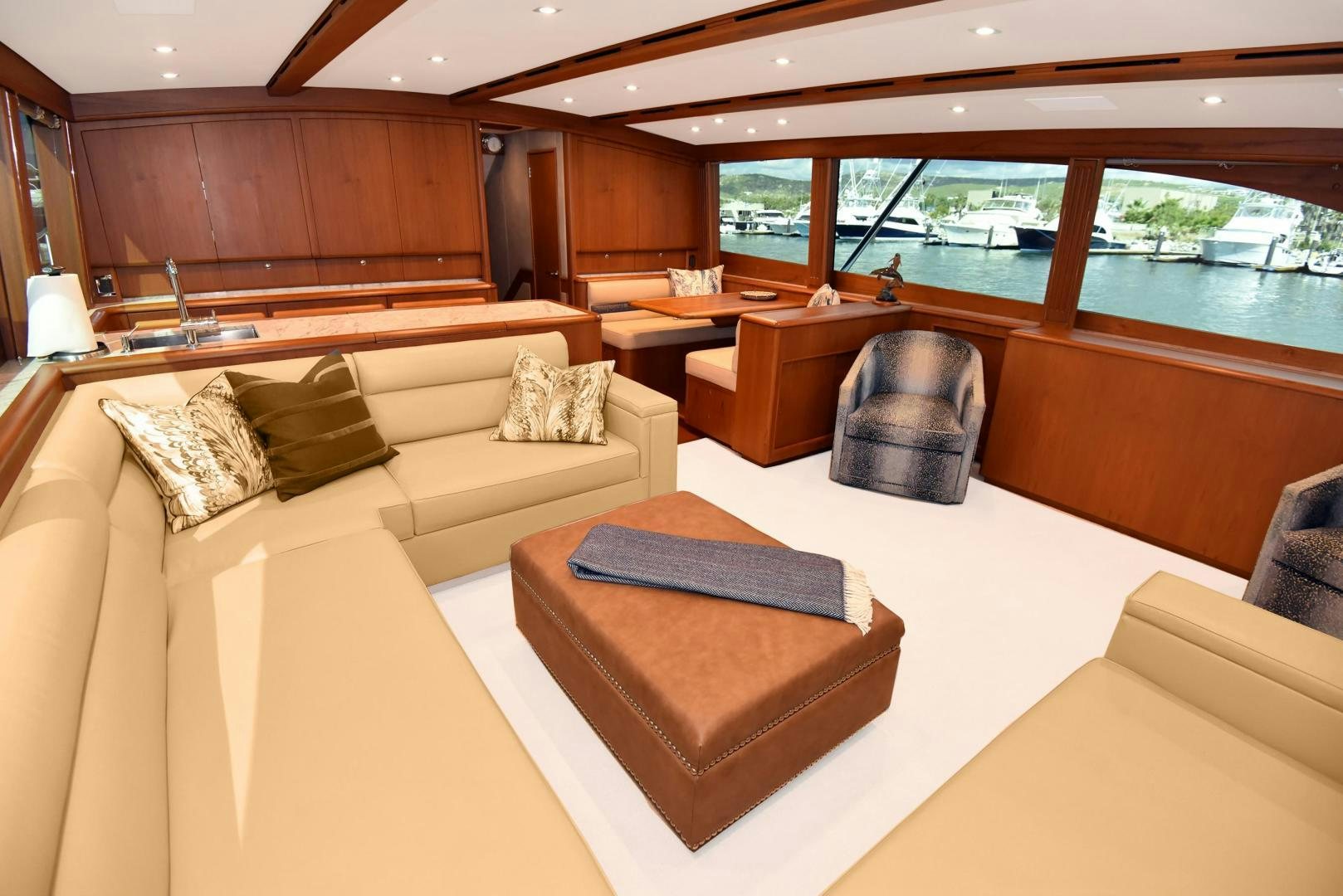 a living room with a couch and a table aboard MY LYNN Yacht for Sale