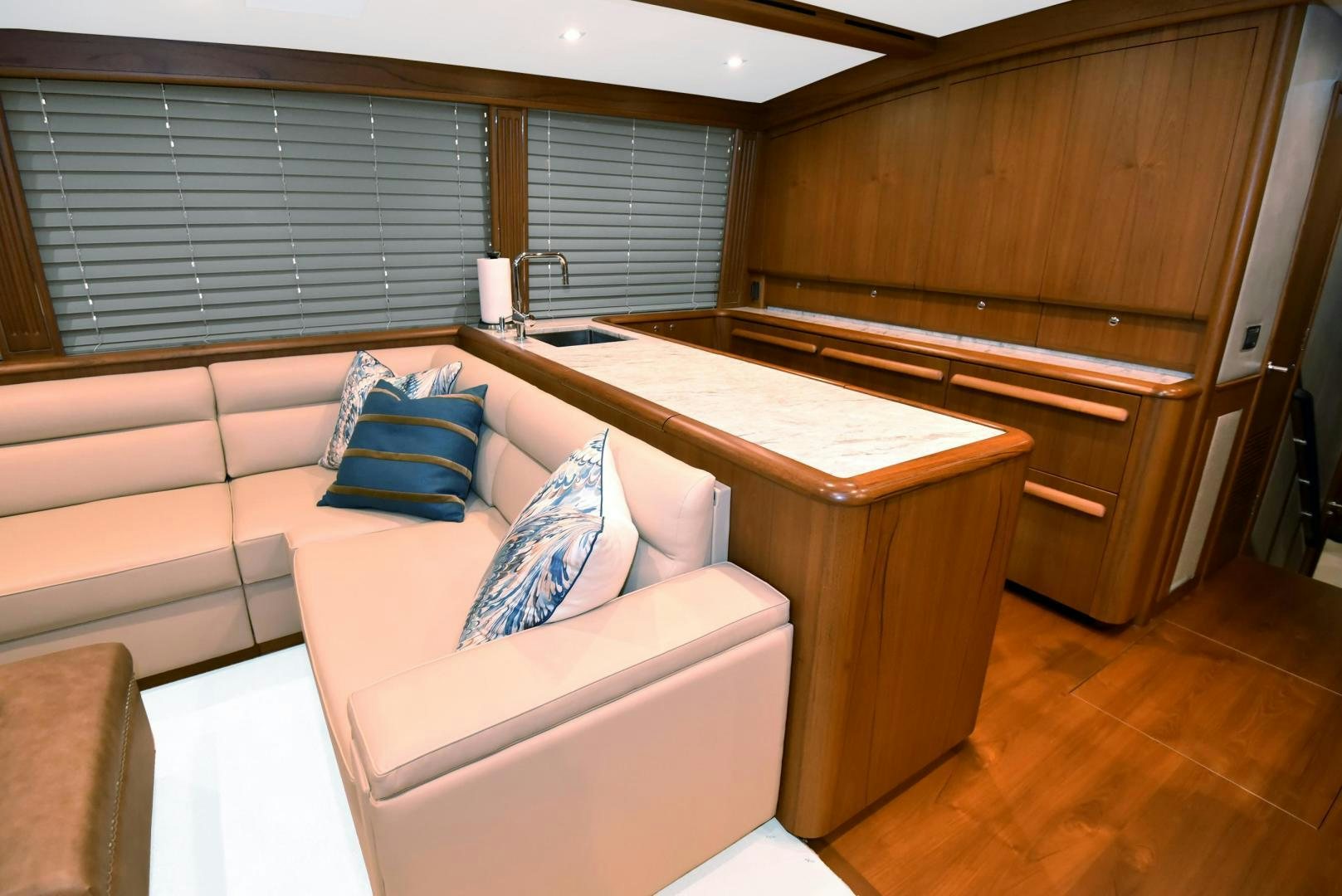 a room with a bed and a desk aboard MY LYNN Yacht for Sale