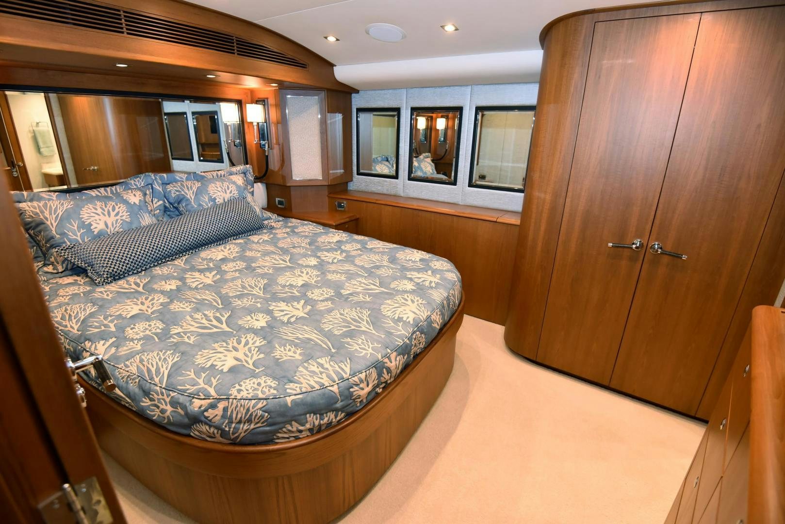 a large bedroom with a large bed aboard MY LYNN Yacht for Sale