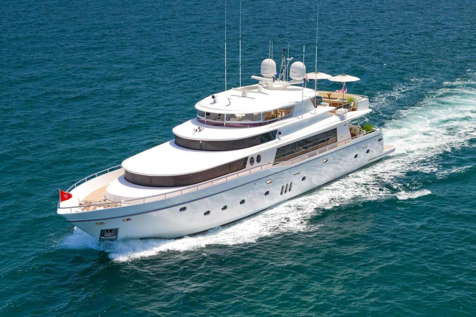 a white boat in the water aboard INCEPTION Yacht for Sale