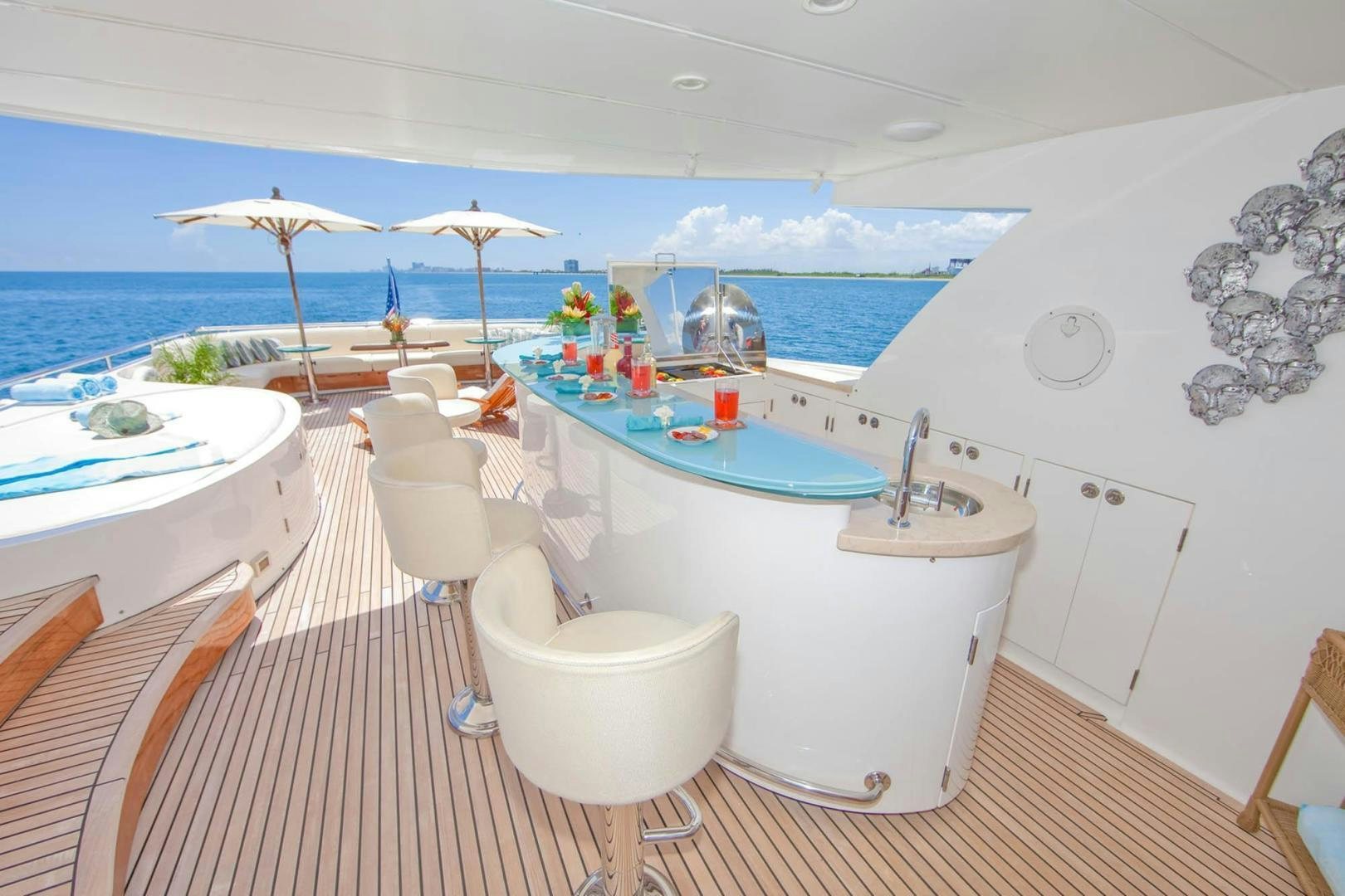 a large swimming pool aboard INCEPTION Yacht for Sale
