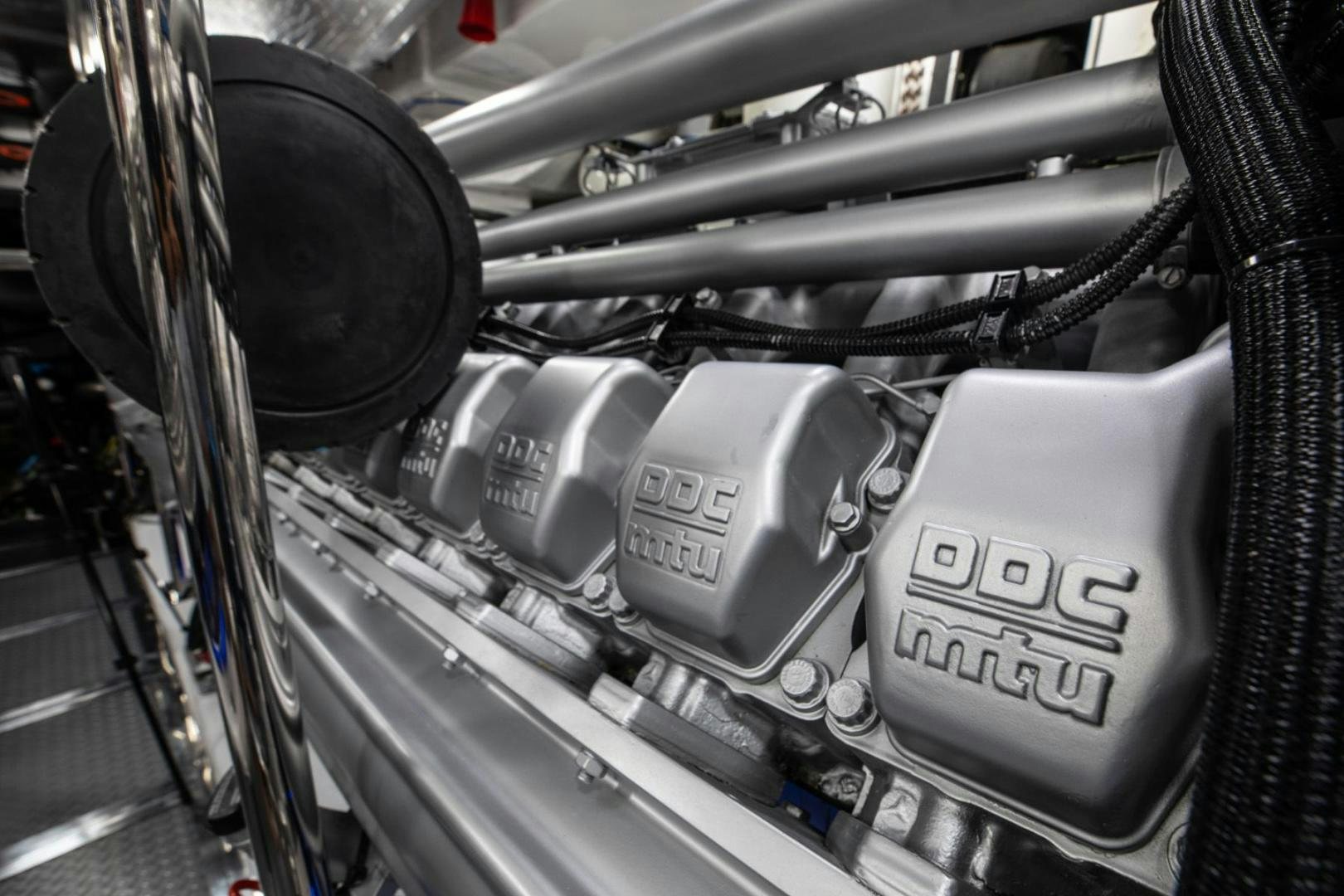 a close-up of a car engine aboard AMORA Yacht for Sale