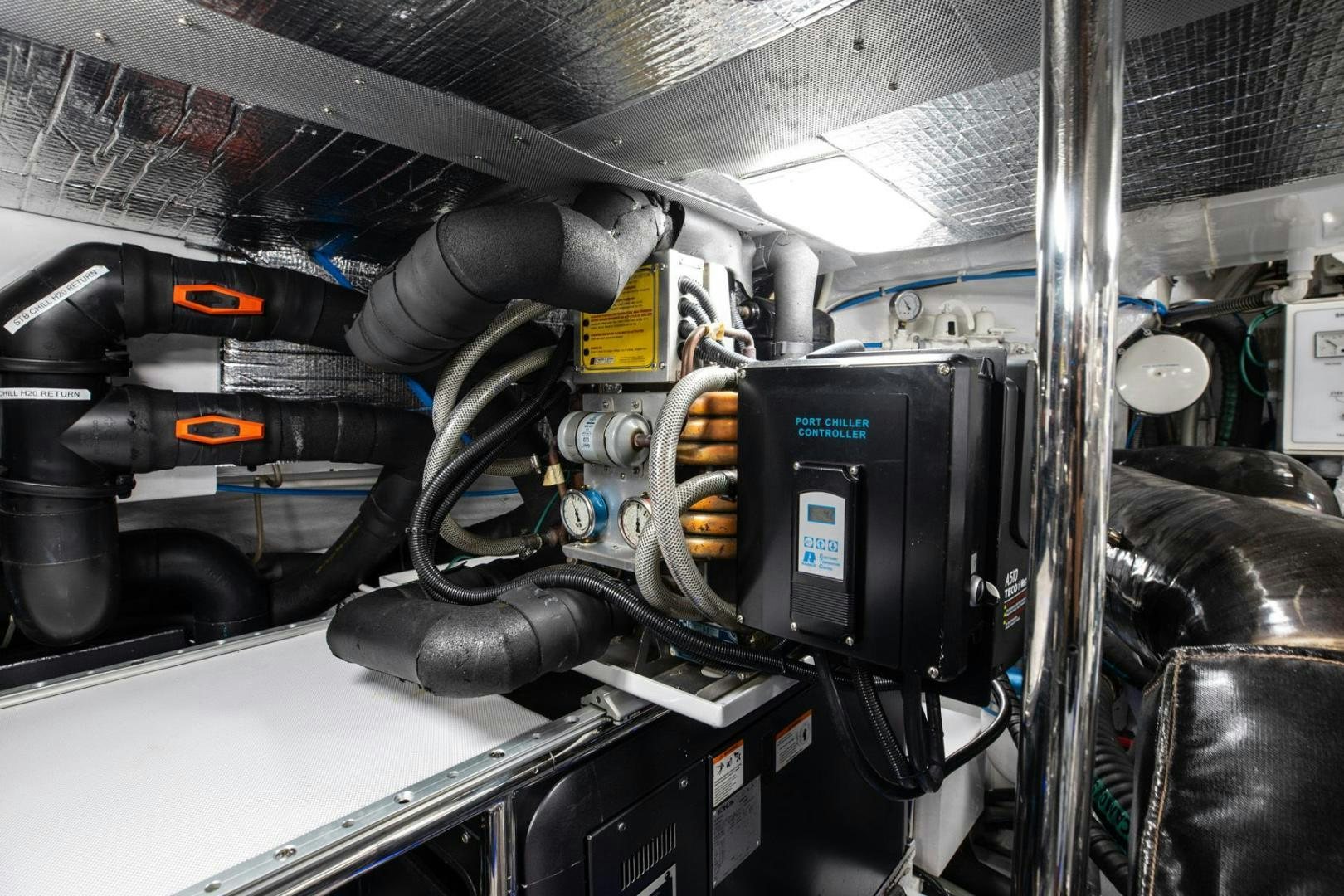 a machine with a large metal pipe aboard AMORA Yacht for Sale