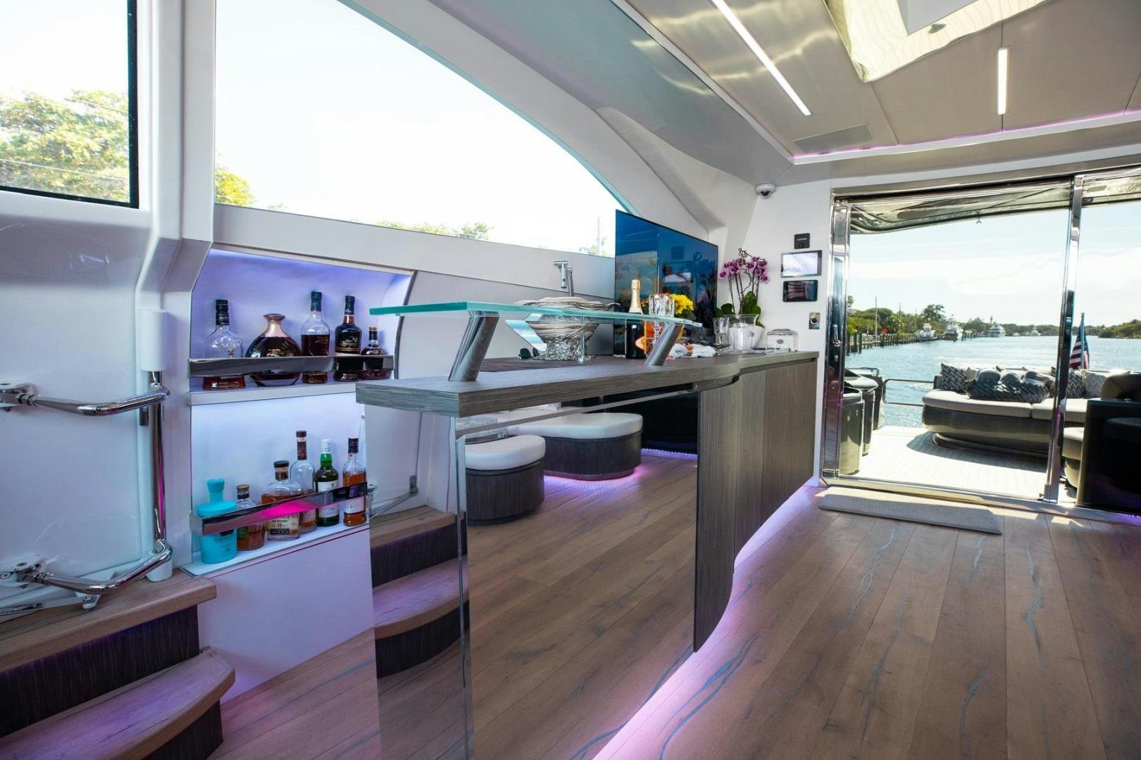 a kitchen with a large window aboard AMORA Yacht for Sale