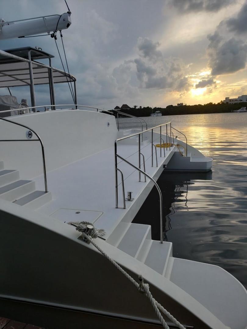 a boat on the water aboard COMPASS Yacht for Sale