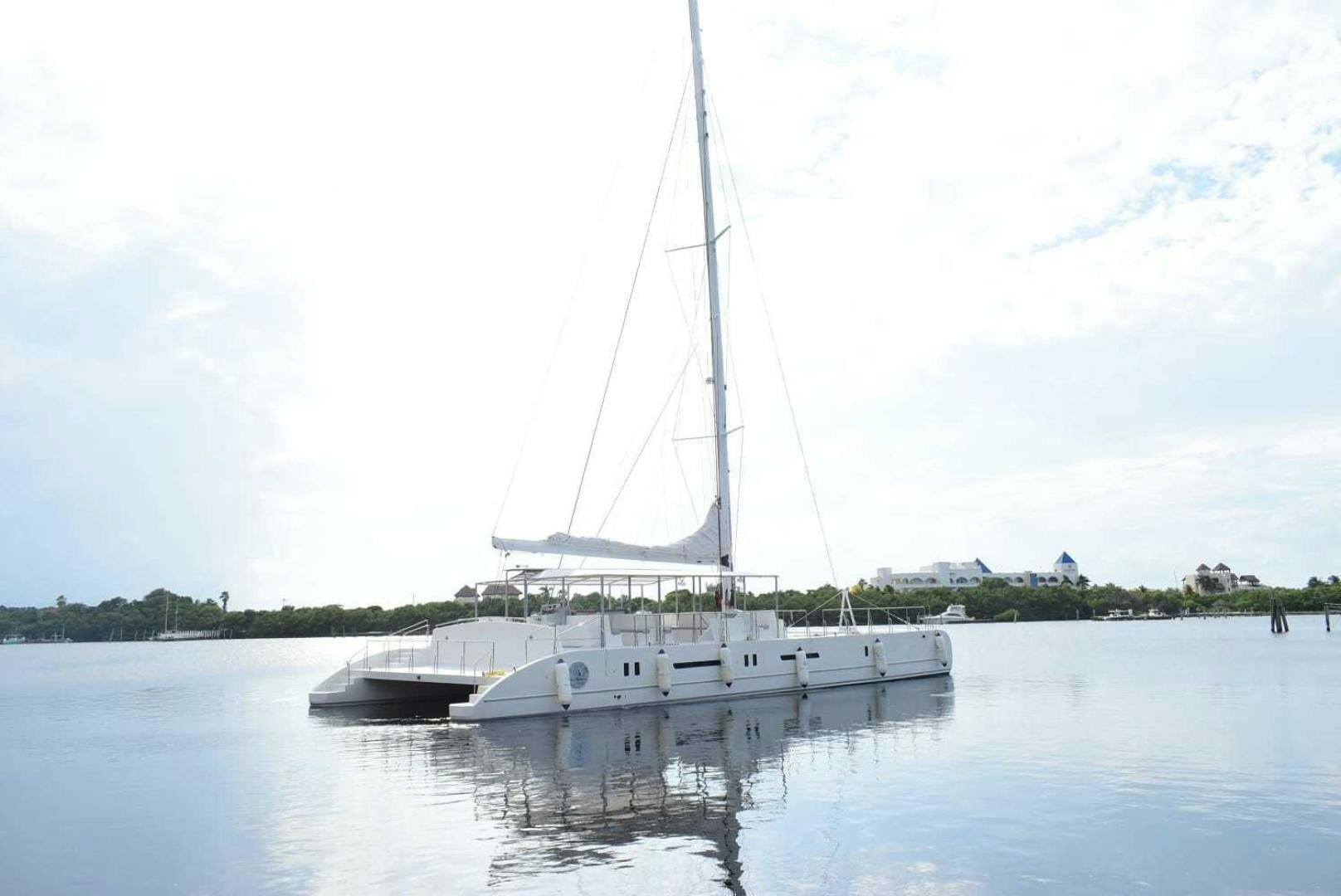 a sailboat on the water aboard COMPASS Yacht for Sale