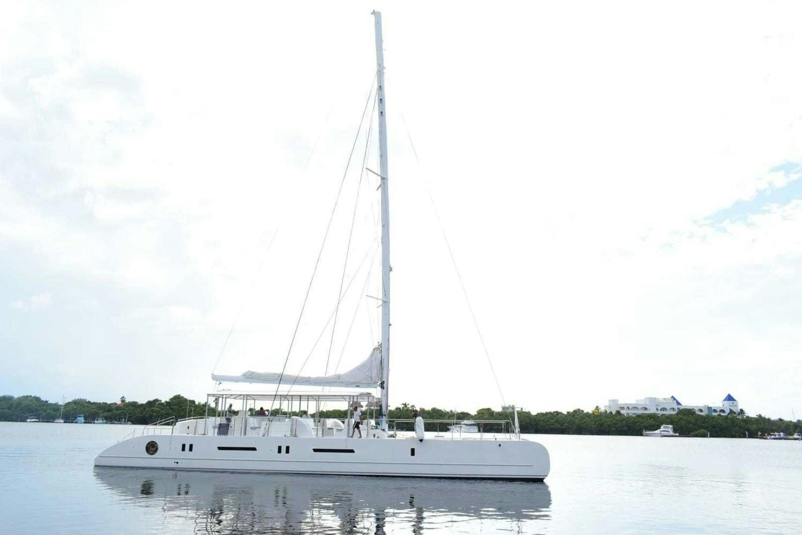 a sailboat on the water aboard COMPASS Yacht for Sale