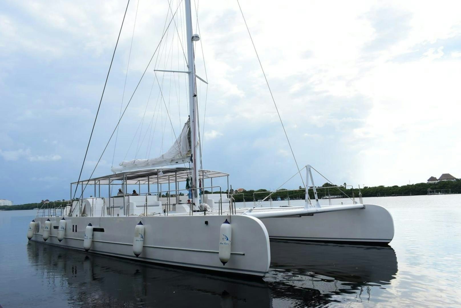 a boat on the water aboard COMPASS Yacht for Sale